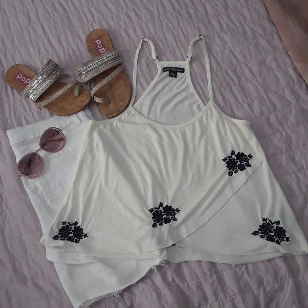 NWOT Cream colored tank with black flowers.